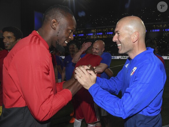 Usain Bolt et Zinédine Zidane - Les Bleus de France98 se sont imposés (3-2) face à une sélection FIFA 98 pour le match des légendes pour l?anniversaire des 20 ans du sacre mondial à la U Arena à Nanterre, France, le 12 juin 2018. © Bestimage