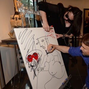 Béatrice Dalle, Julien Marinetti lors de l'inauguration de la galerie Bartoux à Paris le 28 juin 2018. © Rachid Bellak / Bestimage