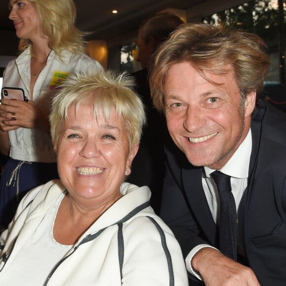 Semi-exclusif - Mimie Mathy et Laurent Delahousse - Soirée du 90ème anniversaire de Line Renaud sur le Bateau Potel et Chabot "Pavillon Seine" à Paris le 2 juillet 2018. © Coadic Guirec/Bestimage