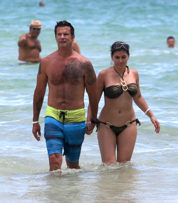 Lorenzo Lamas et sa femme Shawna Craig profitent du "Labor Day" pour aller a la plage a Miami. Le 2 septembre 2013.