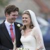 James et Laura Meade lors de leur mariage à Gayton dans le Norfolk, le 14 septembre 2013. Laura a été choisie pour marraine du prince Louis de Cambridge.