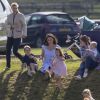 Catherine Kate Middleton, duchesse de Cambridge, le prince George, la princesse Charlotte, pieds nus, lors d'un match de polo caritatif au Beaufort Polo Club à Tetbury le 10 juin 2018. Le Maserati Royal Charity Polo Trophy est destiné à recueillir des fonds pour deux organismes de bienfaisance, "The Royal Marsden" et "Centrepoint".  Tetbury, UNITED KINGDOM - British royal P.William, The Duke of Cambridge, takes part in the Maserati Royal Charity Polo Trophy at Beaufort Polo Club in Gloucestershire. The charity match will help raise funds and awareness for two charities, The Royal Marsden, which The Duke supports as President, and Centrepoint, of which His Royal Highness is Patron. The match, which sees the Maserati team take on the Dhamani 1969 side, is part of the Gloucestershire Festival of Polo, hosted by Beaufort Polo Club from 9th-10th June. This match is part of a series of charitable polo matches that The Duke and P.Harry will play in this summer.10/06/2018 - Tetbury