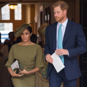 La duchesse Meghan de Sussex (Meghan Markle) et le prince Harry assistaient le 9 juillet 2018 au baptême du prince Louis de Cambridge en la chapelle royale du palais St James, à Londres.