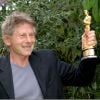 Roman Polanski recevant l'Oscar du meilleur réalisateur pour le film "Le Pianiste" au Festival de Deauville en septembre 2003.