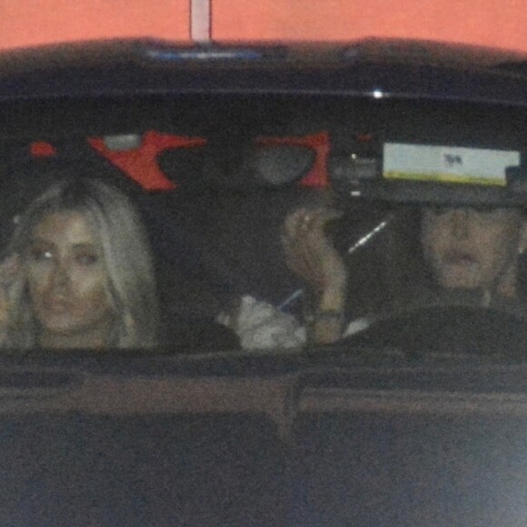Caitlyn Jenner est allée dîner avec sa compagne Sophia Hutchins au restaurant Nobu à Malibu. Caitlyn quitte le restaurant au volant de sa Porsche violette, le 11 juillet 2018.