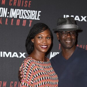 Lilian Thuram et sa compagne Kareen Guiock au photocall lors de l'avant-première mondiale de "Mission: Impossible Fallout" au Palais de Chaillot à Paris, le 12 juillet 2018. © Giancarlo Gorassini/Bestimage