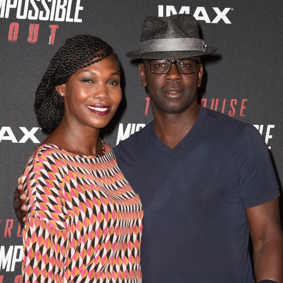 Lilian Thuram et sa compagne Kareen Guiock au photocall lors de l'avant-première mondiale de "Mission: Impossible Fallout" au Palais de Chaillot à Paris, le 12 juillet 2018. © Giancarlo Gorassini/Bestimage