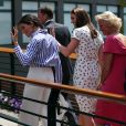  La duchesse Catherine de Cambridge (Kate Middleton) et la duchesse Meghan de Sussex (Meghan Markle) arrivant à Wimbledon le 14 juillet 2018, quelques dizaines de minutes avant le début de la finale dames opposant Serena Williams et Angelique Kerber. 