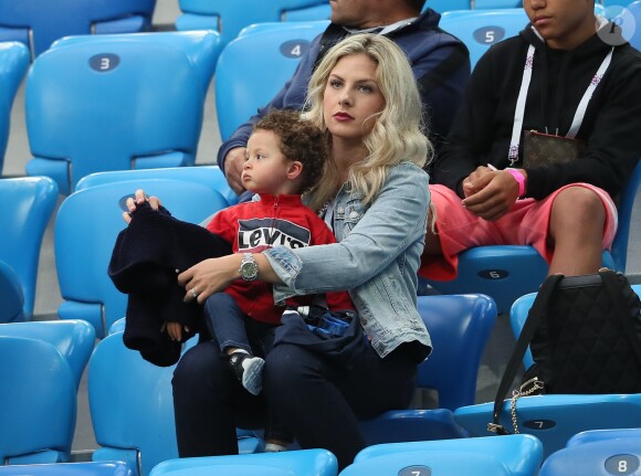 La femme de R. Varane, Camille Tytgat et son fils Ruben - Célébrités dans les tribunes lors de la demi-finale de la coupe du monde opposant la France à la Belgique à Saint-Pétersbourg le 10 juillet 2018 © Cyril Moreau/Bestimage