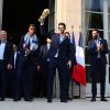 Didier Deschamps, Presnel Kimpembe, Hugo Lloris, Adil Rami - Le président de la République Française E. Macron et la Première dame B. Macron, accueillent les joueurs de l'équipe de France (Les Bleus) et son sélectionneur D. Deschamps, le président de la Fédération Française de Football N. Le Graët et des membres de la FFF, dans les jardins du Palais de l'Elysée à Paris, le 16 juillet 2018. © Sébastien Valiela/Bestimage