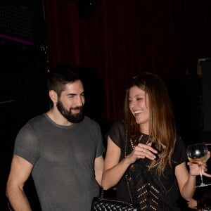 Nikola Karabatic et sa compagne Géraldine Pillet - Les champions du monde de handball fêtent leur victoire au VIP Room à Paris le 2 février 2015.