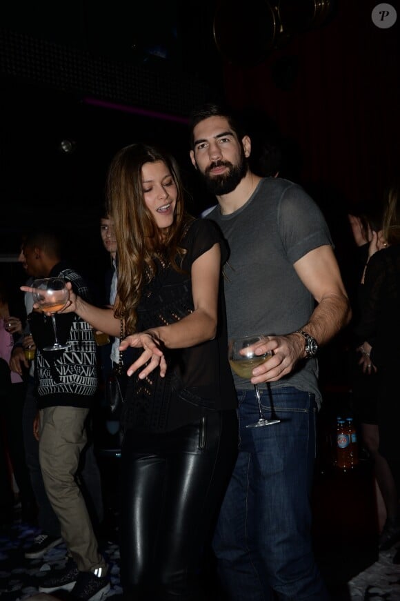 Nikola Karabatic et sa compagne Géraldine Pillet - Les champions du monde de handball fêtent leur victoire au VIP Room à Paris le 2 février 2015.