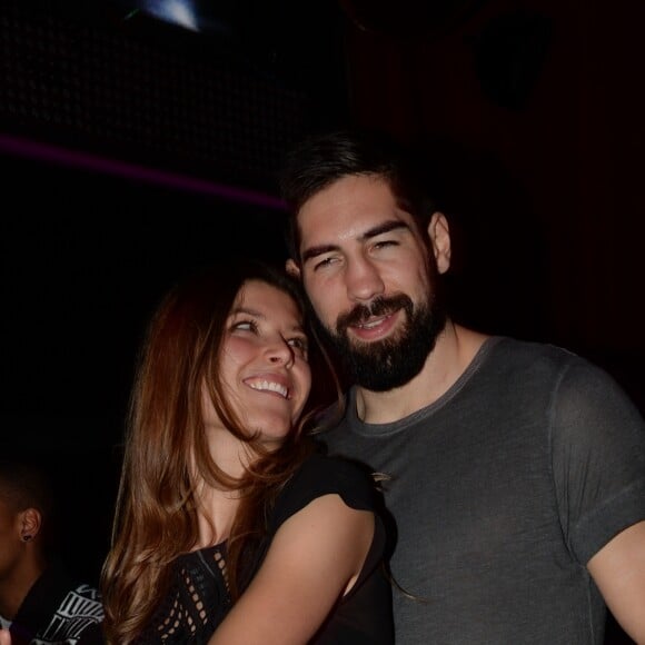 Nikola Karabatic et sa compagne Géraldine Pillet - Les champions du monde de handball fêtent leur victoire au VIP Room à Paris le 2 février 2015.