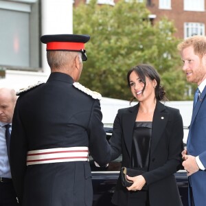 Le prince Harry, duc de Sussex, et Meghan Markle, duchesse de Sussex (en combinaison Altuzarra), arrivant à l'hôtel Royal Dorchester pour la cérémonie annuelle des WellChild Awards à Londres le 4 septembre 2018.