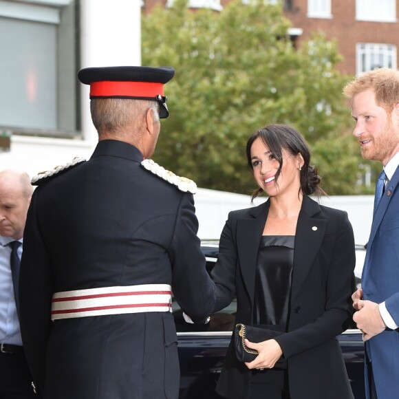 Le prince Harry, duc de Sussex, et Meghan Markle, duchesse de Sussex (en combinaison Altuzarra), arrivant à l'hôtel Royal Dorchester pour la cérémonie annuelle des WellChild Awards à Londres le 4 septembre 2018.