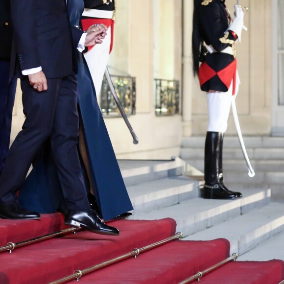 Le président de la République française Emmanuel Macron et sa femme la Première Dame Brigitte Macron (Trogneux) - Le président de la République française et sa femme la Première Dame reçoivent le président de la République de Corée du Sud et sa femme pour un diner d'Etat au palais de l'Elysée à Paris, France, le 15 octobre 2018. © Stéphane Lemouton/Bestimage