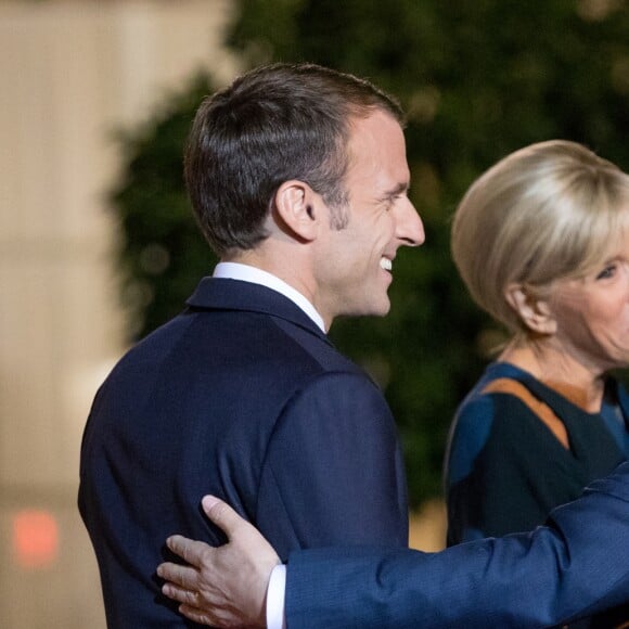 Le président de la République française Emmanuel Macron, sa femme la Première Dame Brigitte Macron (Trogneux), le président de la République de Corée du Sud Moon Jae-in et sa femme Kim Jung-Sook - Le président de la République française et sa femme la Première reçoivent le président de la République de Corée du Sud et sa femme pour un diner d'Etat au palais de l'Elysée à Paris, France, le 15 octobre 2018. © Cyril Moreau/Bestimage