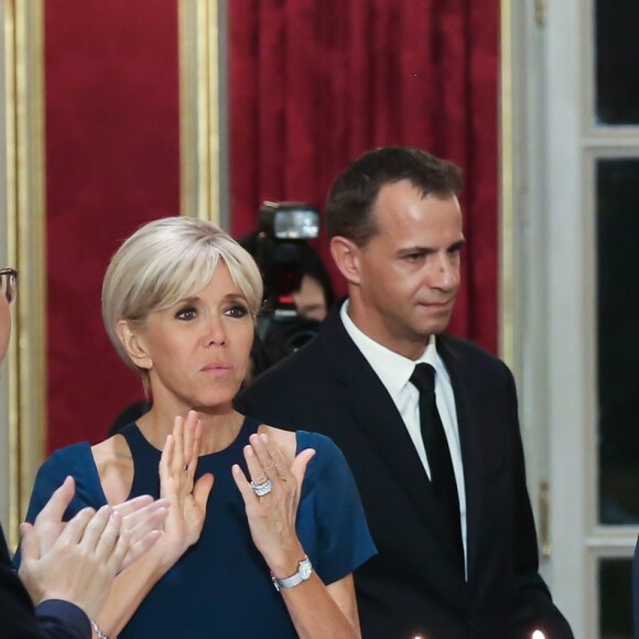 La Première Dame Brigitte Macron, le président de la République de Corée du Sud Moon Jae-in et le président de la République française Emmanuel Macron - Le président de la République française, sa femme la Première Dame, le président de la République de Corée du Sud et sa femme lors du dîner d'Etat au palais de l'Elysée à Paris, France, le 15 octobre 2018. © Stéphane Lemouton/Bestimage