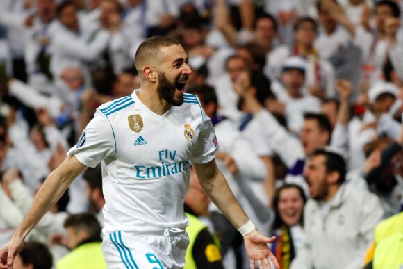 L'attaquand du Real Madrid Karim Benzema célèbre après avoir marqué un but - Le Real Madrid en finale de la Ligue des champions après son match nul (2-2) contre le Bayern Munich au stade Santiago-Bernabéu à Madrid, Espagne, le 1er mai 2018