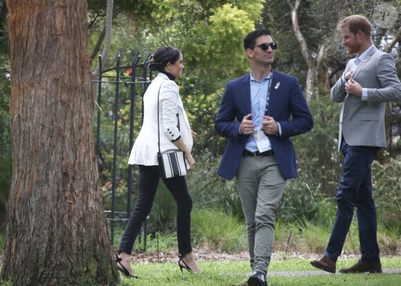 Le prince Harry, duc de Sussex, et Meghan Markle, duchesse de Sussex, enceinte, se rendent au "Domain", un espace ouvert de 34 hectares à Sydney, le 21 octobre 2018.