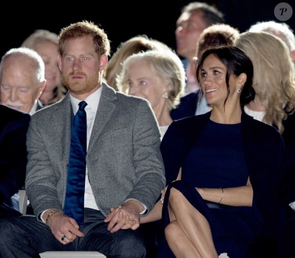 Le prince Harry, duc de Sussex, et Meghan Markle, duchesse de Sussex, enceinte, assistent à la cérémonie d'ouverture des "Invictus Games 2018" à Sydney, le 20 octobre 2018.