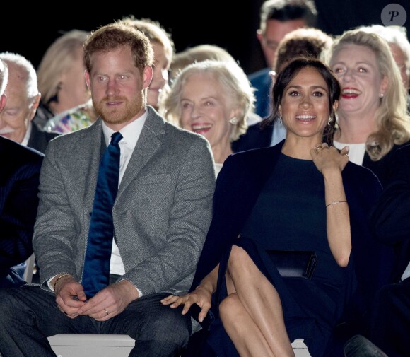 Le prince Harry, duc de Sussex, et Meghan Markle, duchesse de Sussex, enceinte, assistent à la cérémonie d'ouverture des "Invictus Games 2018" à Sydney, le 20 octobre 2018.