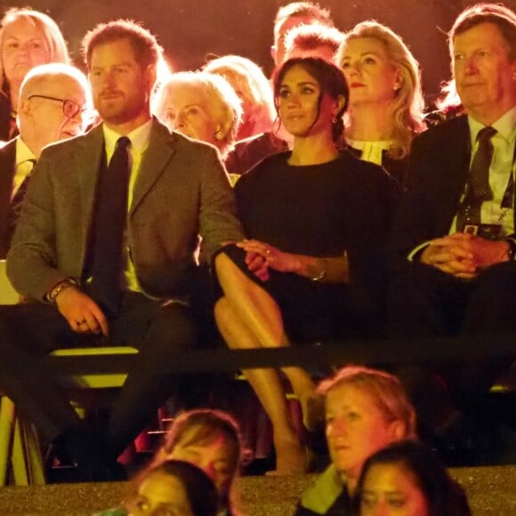 Le prince Harry, duc de Sussex, et Meghan Markle, duchesse de Sussex, enceinte, assistent à la cérémonie d'ouverture des "Invictus Games 2018" à Sydney, le 20 octobre 2018.