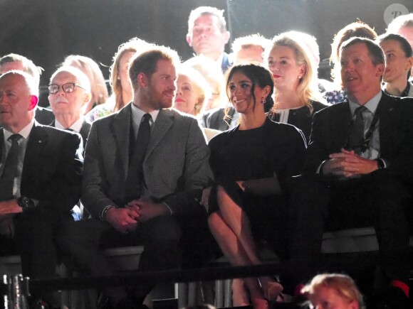 Le prince Harry, duc de Sussex, et Meghan Markle, duchesse de Sussex, enceinte, assistent à la cérémonie d'ouverture des "Invictus Games 2018" à Sydney, le 20 octobre 2018.