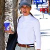 Selma Blair se balade avec un ami dans les rues de Los Angeles, le 5 juillet 2018.