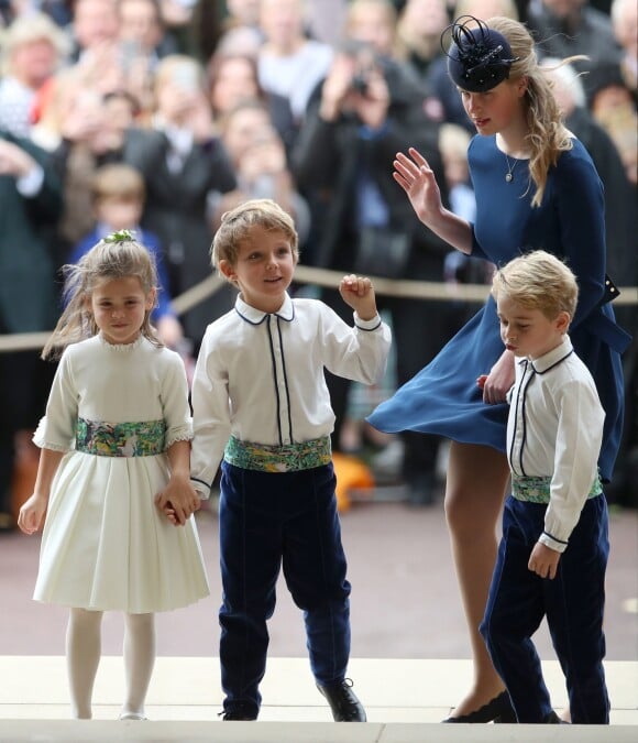 Theodora Williams, la fille de Robbie Williams, Louis de Givenchy, Lady Louise Windsor et le prince George de Cambridge lors du mariage de la princesse Eugenie d'York et Jack Brooksbank en la chapelle Saint-George au château de Windsor le 12 octobre 2018.