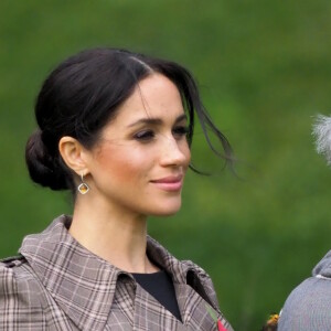 Le prince Harry, duc de Sussex, et Meghan Markle, duchesse de Sussex, enceinte assistent à une cérémonie de bienvenue traditionnelle sur les pelouses de la Government House à Wellington, en Nouvelle-Zélande le 28 octobre 2018.