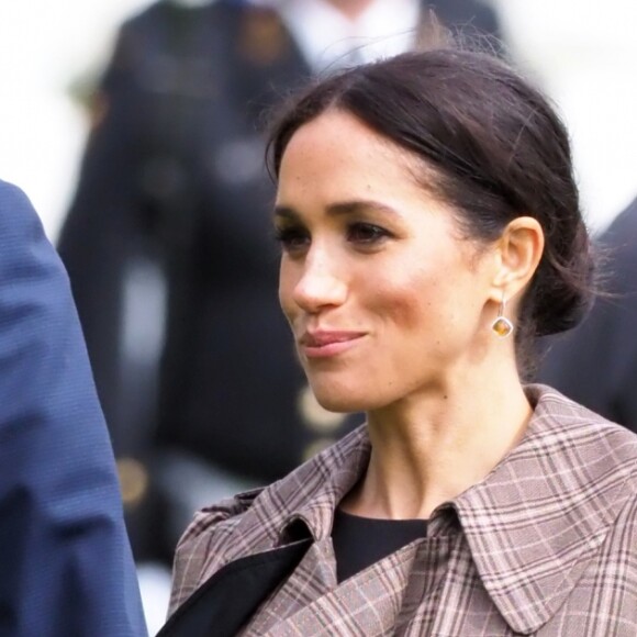 Le prince Harry, duc de Sussex, et Meghan Markle, duchesse de Sussex, enceinte assistent à une cérémonie de bienvenue traditionnelle sur les pelouses de la Government House à Wellington, en Nouvelle-Zélande le 28 octobre 2018.