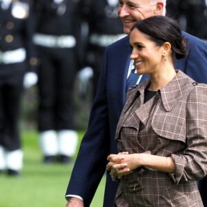 Le prince Harry, duc de Sussex, et Meghan Markle, duchesse de Sussex, enceinte assistent à une cérémonie de bienvenue traditionnelle sur les pelouses de la Government House à Wellington, en Nouvelle-Zélande le 28 octobre 2018.