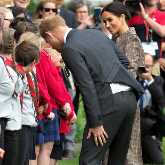 Le prince Harry, duc de Sussex, et Meghan Markle, duchesse de Sussex, enceinte assistent à une cérémonie de bienvenue traditionnelle sur les pelouses de la Government House à Wellington, en Nouvelle-Zélande le 28 octobre 2018.