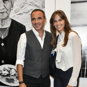 Exclusif - Nikos Aliagas et Ophélie Meunier - Nikos Aliagas lance son exposition "L'EPREUVE DU TEMPS - INSTANTS PHOTOGRAPHIQUES" et son livre "L'EPREUVE DU TEMPS" sur le toit de la grande Arche de la Défense à Paris, France, le 25 octobre 2018. © Pierre Perusseau/Bestimage