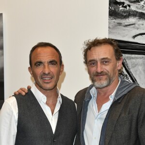 Exclusif - Nikos Aliagas et Jean-Paul Rouve - Nikos Aliagas lance son exposition "L'EPREUVE DU TEMPS - INSTANTS PHOTOGRAPHIQUES" et son livre "L'EPREUVE DU TEMPS" sur le toit de la grande Arche de la Défense à Paris, France, le 25 octobre 2018. © Pierre Perusseau/Bestimage