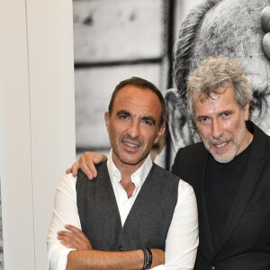 Exclusif - Nikos Aliagas et Stéphane de Bourgies - Nikos Aliagas lance son exposition "L'EPREUVE DU TEMPS - INSTANTS PHOTOGRAPHIQUES" et son livre "L'EPREUVE DU TEMPS" sur le toit de la grande Arche de la Défense à Paris, France, le 25 octobre 2018. © Pierre Perusseau/Bestimage