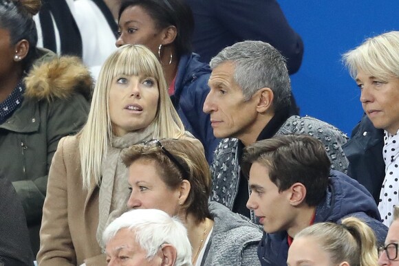 Nagui et sa femme Mélanie Page - People au match de football France Bielorussie au Stade de France à Saint-Denis le 11 octobre 2017. Vainqueur de la Biélorussie (2-1) et première du groupe A au terme des éliminatoires, la France s'est qualifiée pour la Coupe du monde 2018. © Cyril Moreau/Bestimage