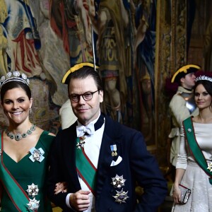 La princesse héritière Victoria de Suède et le prince Daniel lors du dîner officiel donné au palais Drottningholm à Stockholm le 13 novembre 2018 pour la visite officielle du président italien Sergio Mattarella et sa fille Laura.