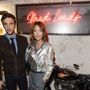 Exclusif - Hugo Philip et sa compagne Caroline Receveur lors du cocktail dînatoire expérimental "Guitar Players Show" organisé à la boutique Mad Lords "House of jewelry", située rue Saint Honoré. Paris, le 22 novembre 2018. © Pierre Perusseau/Bestimage