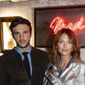 Exclusif - Hugo Philip et sa compagne Caroline Receveur lors du cocktail dînatoire expérimental "Guitar Players Show" organisé à la boutique Mad Lords "House of jewelry", située rue Saint Honoré. Paris, le 22 novembre 2018. © Pierre Perusseau/Bestimage