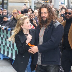 Jason Momoa et Amber Heard à leur arrivée aux studios de AOL Build Series pour faire la promotion du film Aquaman à New York, le 3 décembre 2018.