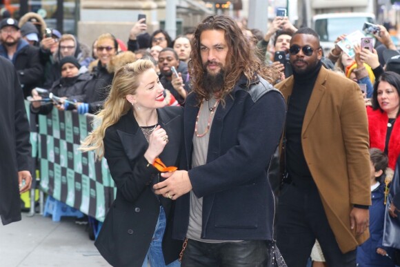 Jason Momoa et Amber Heard à leur arrivée aux studios de AOL Build Series pour faire la promotion du film Aquaman à New York, le 3 décembre 2018.