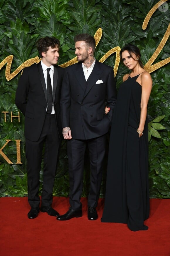 Brooklyn Beckham et ses parents David Beckham et Victoria Beckham assistent aux Fashion Awards 2018 au Royal Albert Hall à Londres, le 10 décembre 2018.