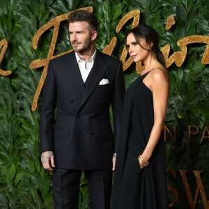 David, Brooklyn et Victoria Beckham assistent aux Fashion Awards 2018 au Royal Albert Hall à Londres, le 10 décembre 2018.