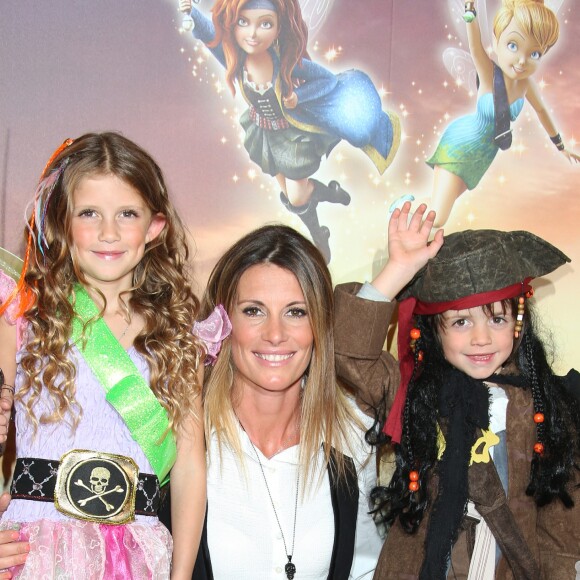 Sophie Thalmann et ses enfants Mika et Charlie - Avant-première du film "Clochette et la Fée Pirate" au Gaumont Marignan sur les Champs-Elysées à Paris, le 25 mars 2014.