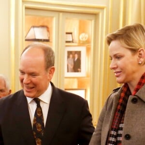 Le prince Albert II de Monaco et la princesse Charlene lors de la remise de colis de Noël à la Croix Rouge monégasque le 13 décembre 2018. © Jean-François Ottonello / Nice Matin / Bestimage