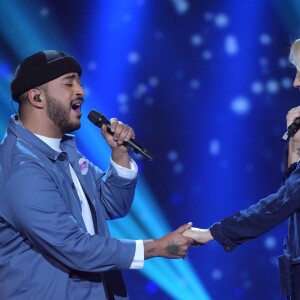 Exclusif - Slimane et Elodie Gossuin - Enregistrement de l'émission "Tout le monde chante contre le cancer : les stars relèvent le défi" au Palais des Sports à Paris, le 11 décembre 2018. Diffusion le 3 janvier 2019 à 21h sur W9.