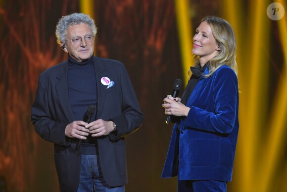 Exclusif - Nelson Monfort et Agathe Lecaron - Enregistrement de l'émission "Tout le monde chante contre le cancer : les stars relèvent le défi" au Palais des Sports à Paris, le 11 décembre 2018. Diffusion le 3 janvier 2019 à 21h sur W9.