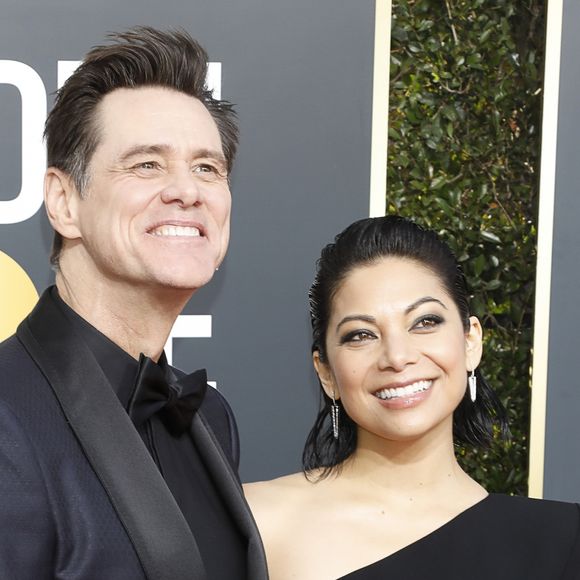 Jim Carrey et sa compagne Ginger Gonzaga au photocall de la 76ème cérémonie annuelle des Golden Globe Awards au Beverly Hilton Hotel à Los Angeles, Californie, Etats-Unis, le 6 janver 2019.